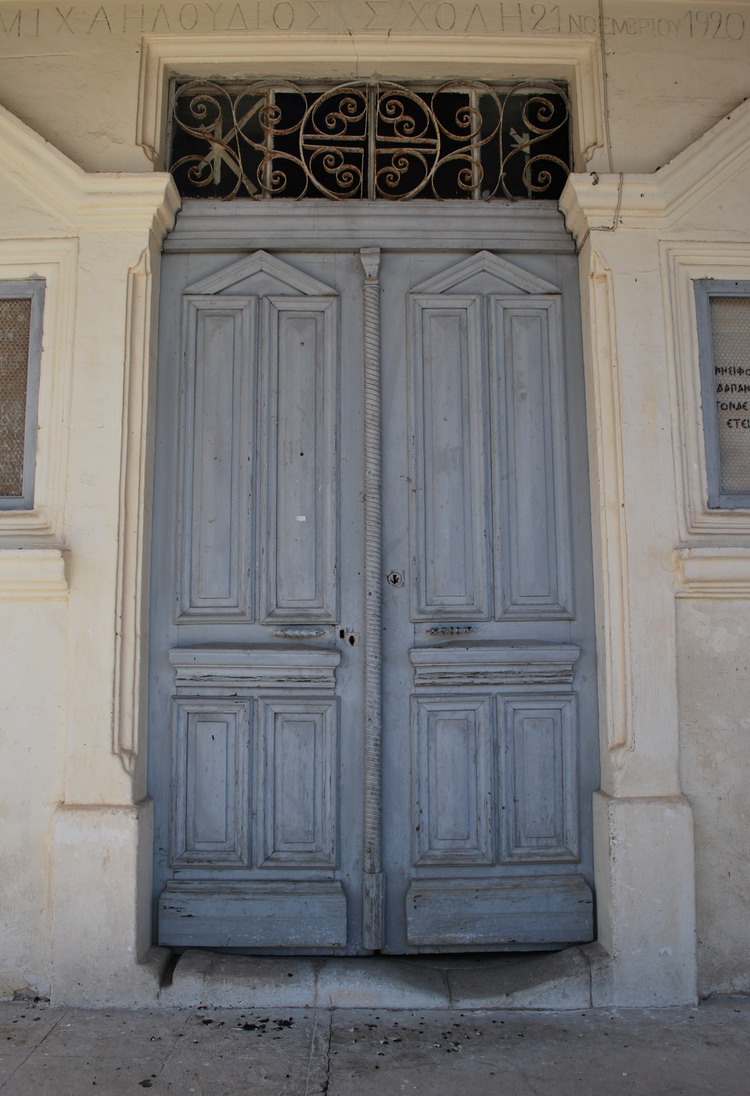 Vavla Larnaca School rustic door with engraving